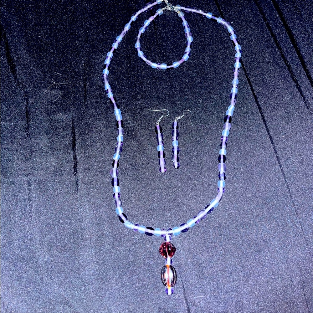 Purple bead necklace with matching earrings and bracelet